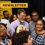 Newsletter: Picture of Nobel Laureate George P. Smith surrounded by members of Mizzou community