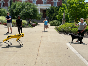 A photo of Steve meeting his canine counterpart on Francis Quadrangle.
