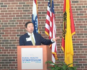 A photo of President Choi speaking at the BioSTL Rural Health Synmposium.