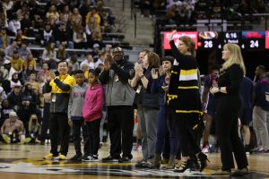 A photo of President Choi honoring Kemper Fellows at the February 12 Mizzou Basketball game.