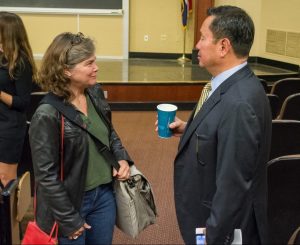 A photo of President Choi speaking with Professor D Cornelison.