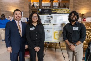 A photo of President Choi with Noura Alhachami and Aravind Kalathil.