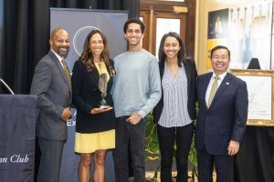 A photo of Chair Roundtree, Golden Quill recipient Natasha Kaiser-Brown, Quinton Brown, Elexandria "Elle" Brown and President Choi.