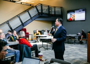 A photo of President Choi meeting with faculty and staff from the College of Education and Human Development.