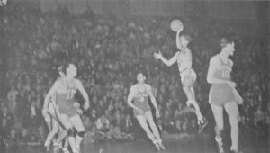 A photo of Matheny shooting a jump shot as part of the Mizzou Basketball team.