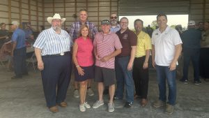 A photo from the 2023 Graves-Chapple Center Fish Fry with state Rep. Dean VanSchoiack, state Rep. Brenda Shields, U.S. Rep. Sam Graves, state Rep. Josh Hurlbert, President Choi, Curator Todd Graves, state Rep. Jeff Farnan and interim Vice Chancellor for Extension and Engagement Chad Higgins