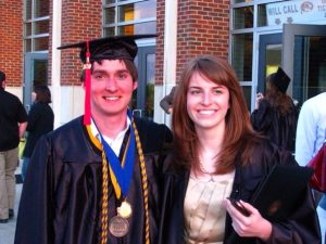 A photo of Chad Day and Emily Van Zandt at graduation in 2009.