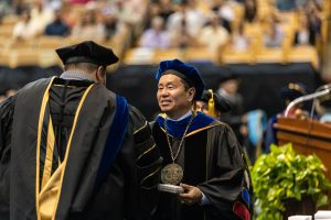 A photo of President Choi at a commencement ceremony.