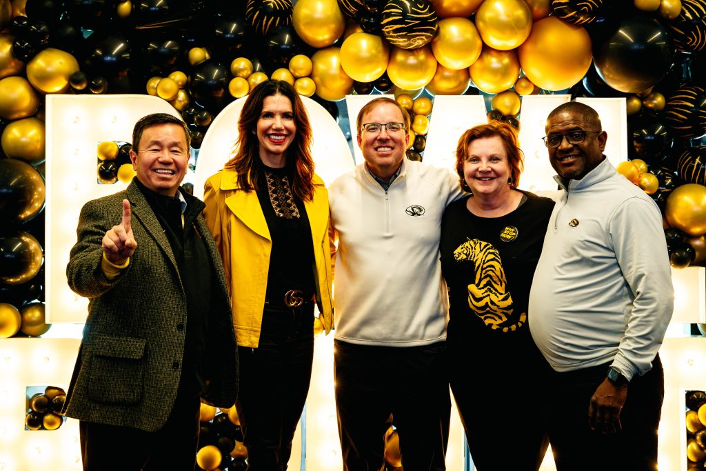 A photo of President Choi, Athletic Director Desiree Reed-Francois, Coach Eli Drinkwitz, University of Missouri Board of Curators Vice Chair Robin Wenneker and UM Board Chair Michael Williams.