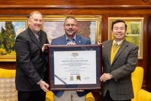 (from left to right): MUPD Sergeant Dennis Stroer, MUPD Chief Brian Weimer and President Choi